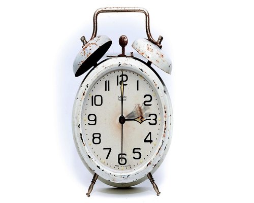 A detailed wooden wall calendar alongside clock hands showing clear scheduled time slots
